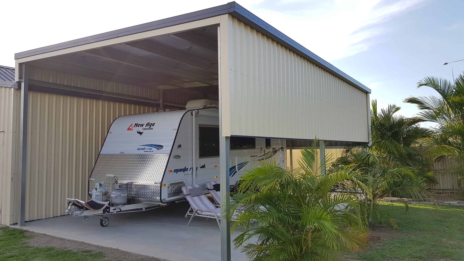 Extra High Double Carport Built Next to Shed to Store Caravan - Bryland Sheds Townsville